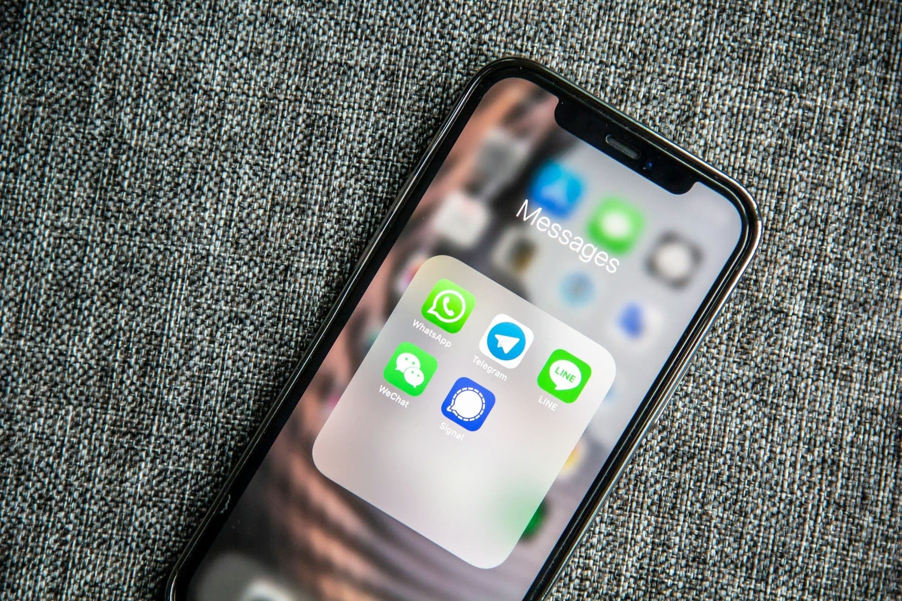 A smartphone showing messaging apps